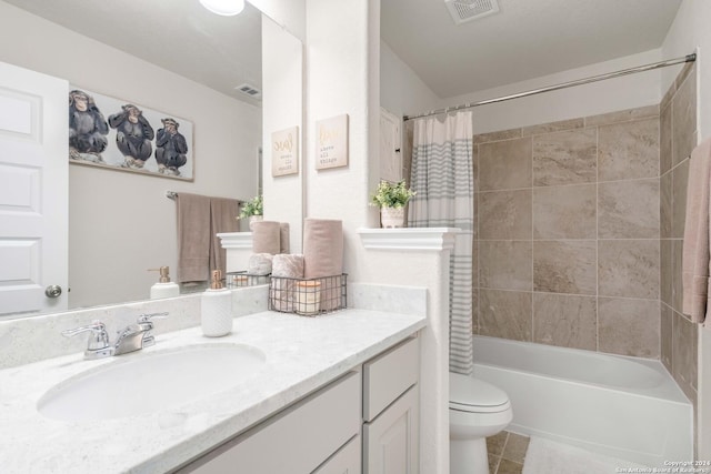 full bathroom featuring vanity, tile patterned floors, toilet, and visible vents