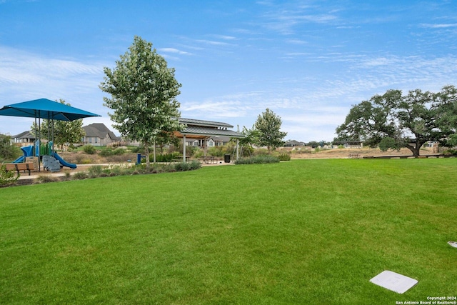 view of yard with a playground