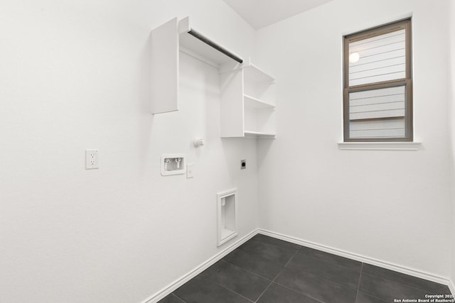 clothes washing area with laundry area, baseboards, gas dryer hookup, washer hookup, and electric dryer hookup