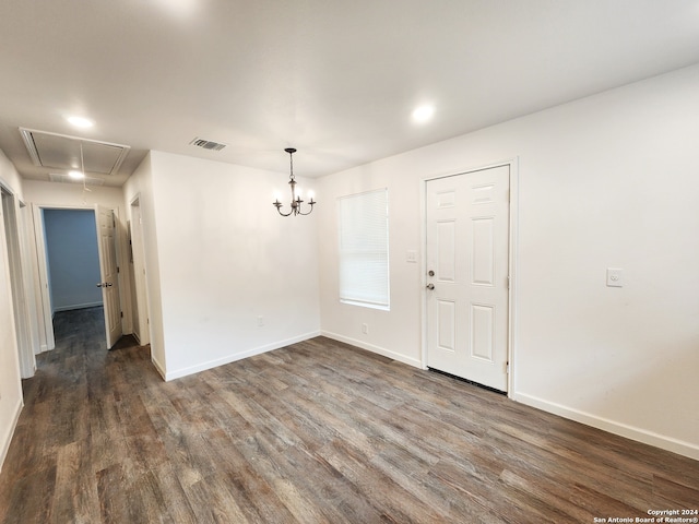 empty room featuring dark wood-type flooring