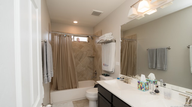 full bathroom with vanity, toilet, and shower / tub combo