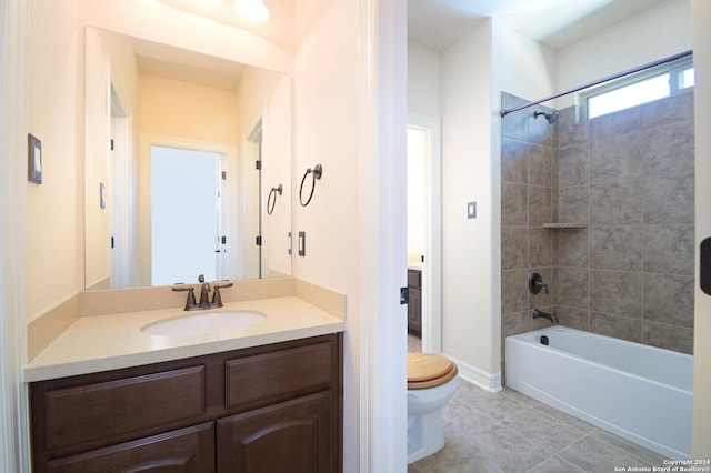 full bathroom with tile patterned flooring, tub / shower combination, vanity, and toilet