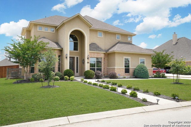 view of front of house with a front yard