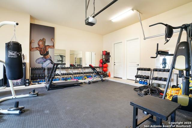 workout area featuring a garage