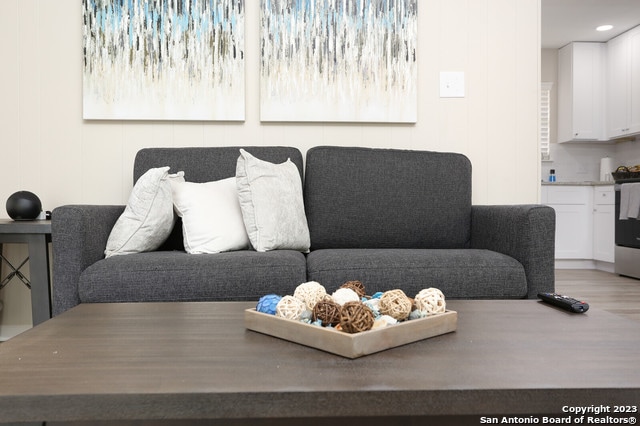 living room with hardwood / wood-style flooring