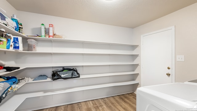 pantry featuring washing machine and dryer