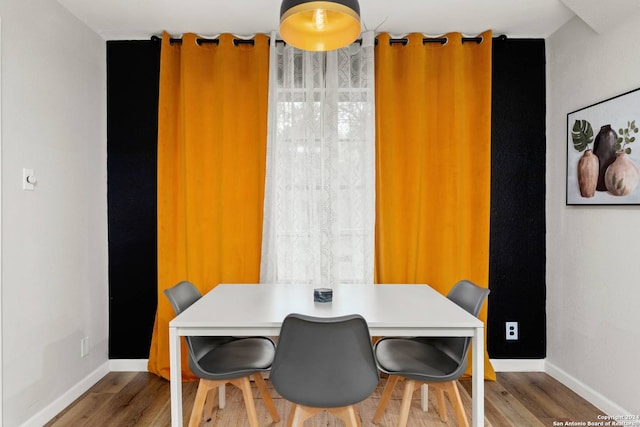 dining room featuring hardwood / wood-style flooring