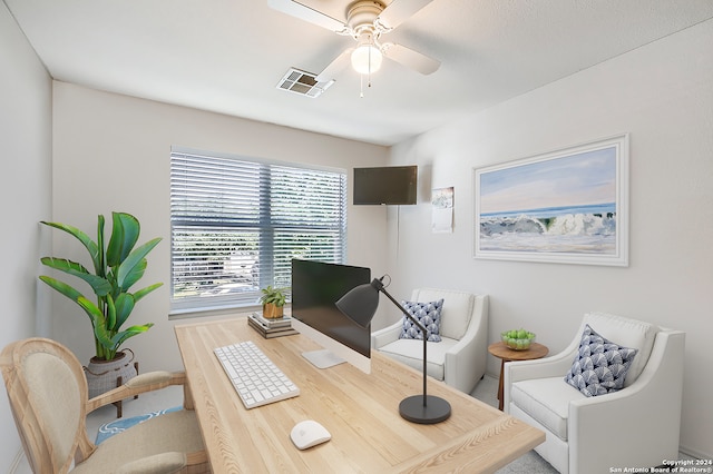 office space with ceiling fan