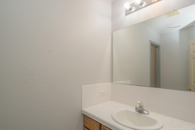 bathroom featuring vanity