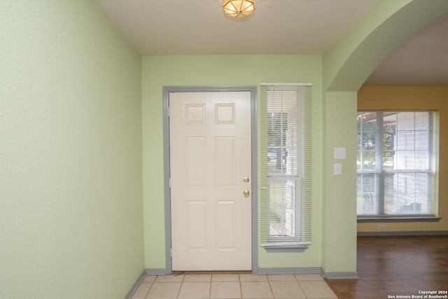 foyer entrance with light hardwood / wood-style floors