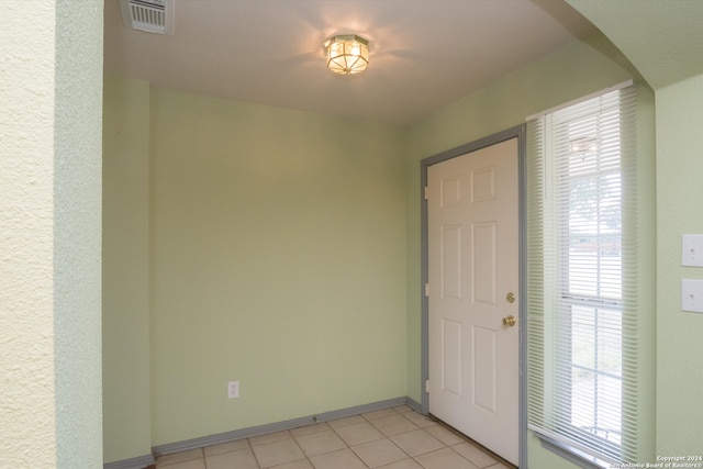 view of tiled foyer