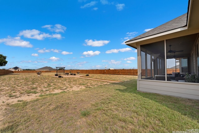 view of yard with a sunroom