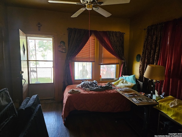 bedroom featuring ceiling fan and hardwood / wood-style flooring