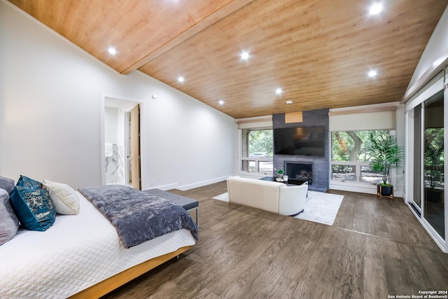 bedroom featuring wood finished floors, recessed lighting, wooden ceiling, lofted ceiling, and a tile fireplace