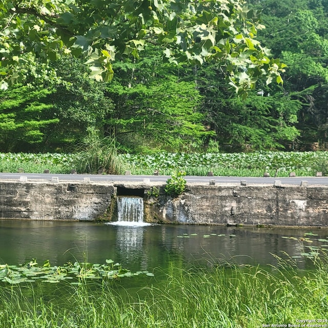 exterior space featuring a water view