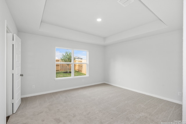 unfurnished bedroom with light colored carpet