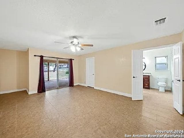 spare room featuring ceiling fan