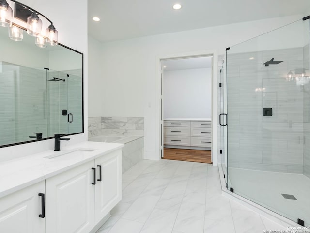 bathroom with vanity and walk in shower