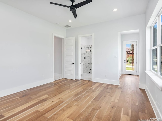 unfurnished room featuring ceiling fan and light hardwood / wood-style flooring