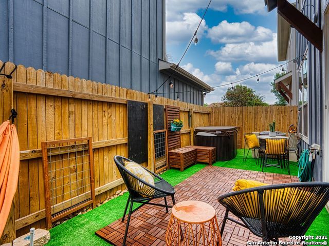 view of patio / terrace with a hot tub