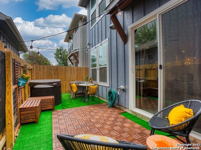 view of patio / terrace with a hot tub