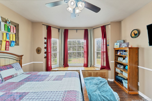 bedroom featuring ceiling fan and hardwood / wood-style flooring