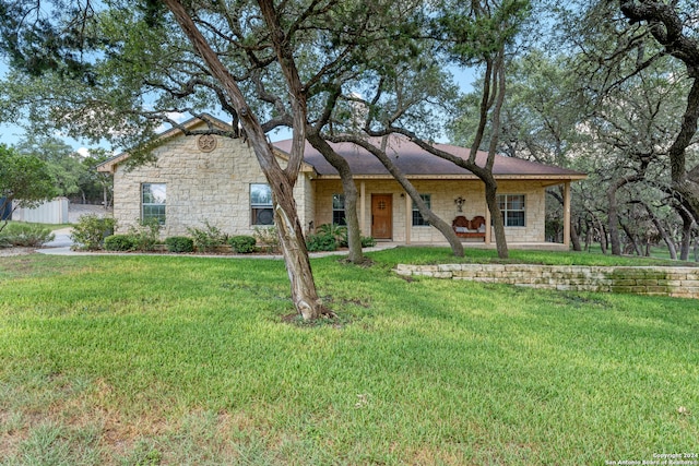 ranch-style house with a front yard