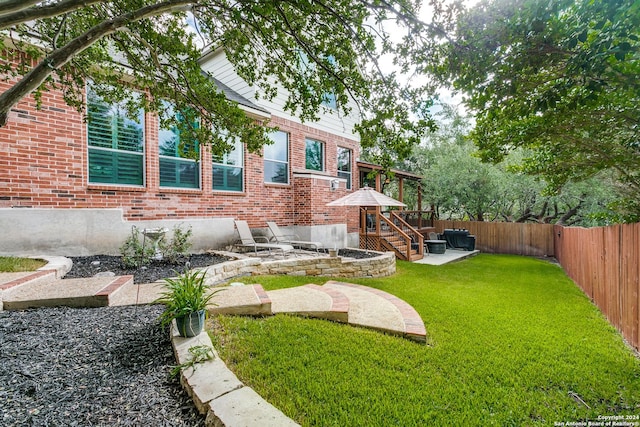 view of yard featuring a patio area and a fenced backyard