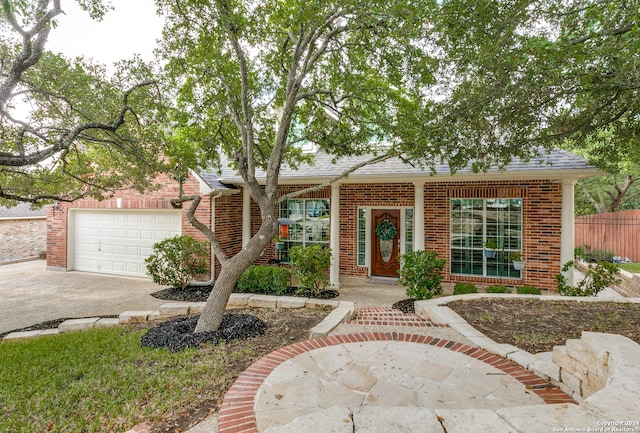 single story home with a garage