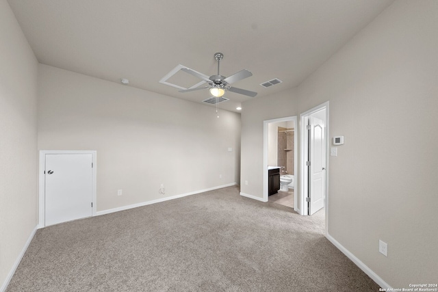 unfurnished room featuring light carpet, visible vents, baseboards, and a ceiling fan