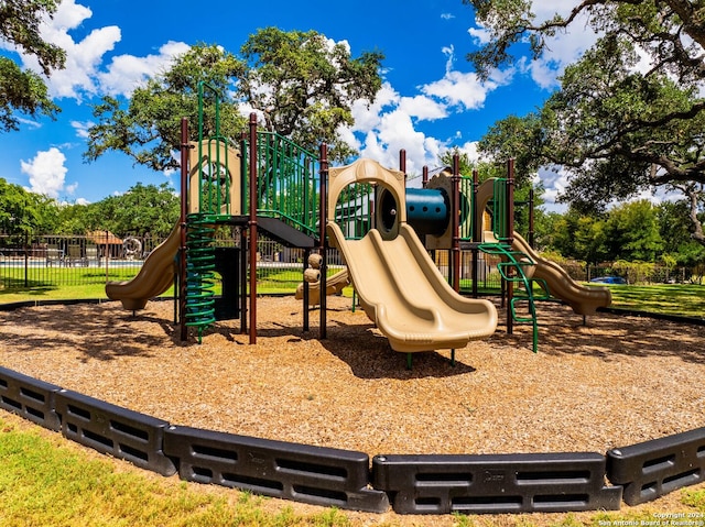 community play area featuring fence