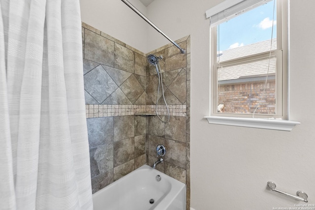 bathroom featuring shower / bathtub combination with curtain