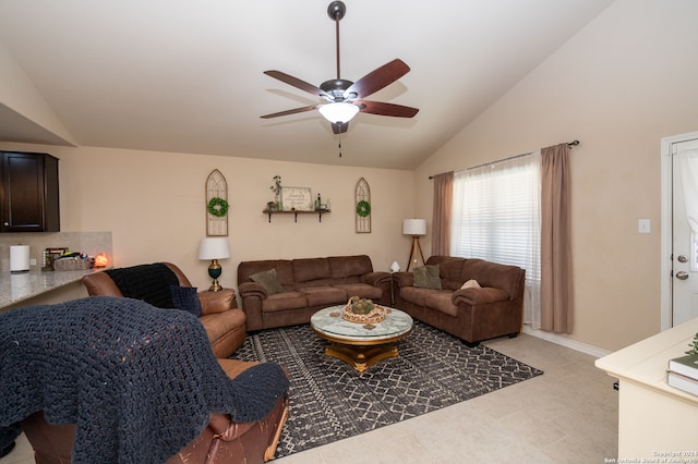 living room featuring ceiling fan and vaulted ceiling