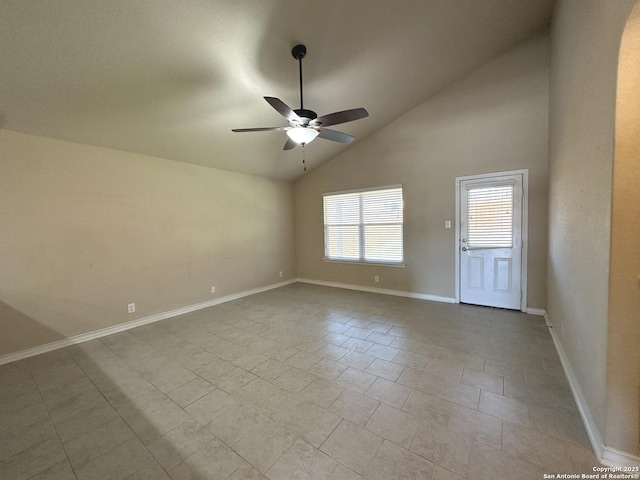 empty room featuring high vaulted ceiling, baseboards, and a ceiling fan