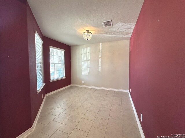 obstructed view of property with a garage and a front yard