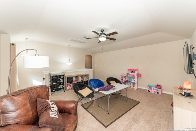 rec room featuring visible vents, baseboards, a ceiling fan, lofted ceiling, and carpet floors