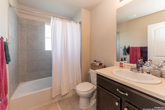 full bathroom featuring shower / bath combo, vanity, toilet, and tile patterned floors