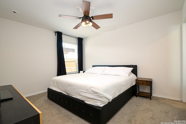 bedroom with carpet flooring and ceiling fan