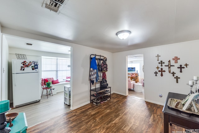 miscellaneous room with hardwood / wood-style floors