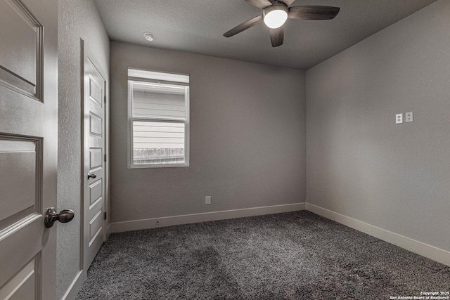 empty room featuring a ceiling fan, carpet flooring, a textured ceiling, and baseboards