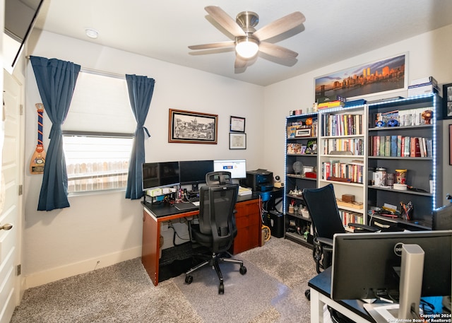 office space with ceiling fan and carpet floors