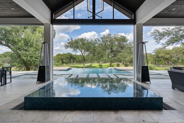 view of pool featuring a patio