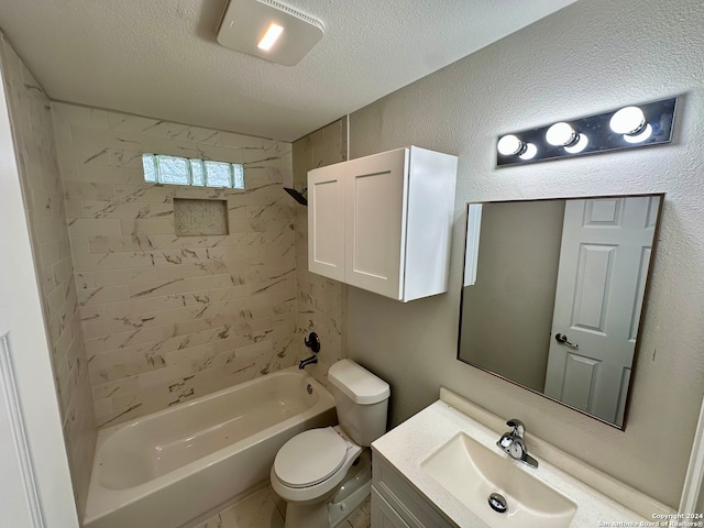 full bathroom with tiled shower / bath combo, vanity, toilet, and a textured ceiling