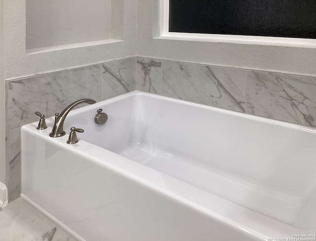 bathroom featuring a bathtub