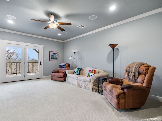 living room featuring baseboards, visible vents, crown molding, carpet flooring, and recessed lighting