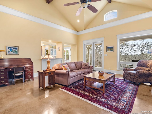 living room featuring high vaulted ceiling, baseboards, and a ceiling fan