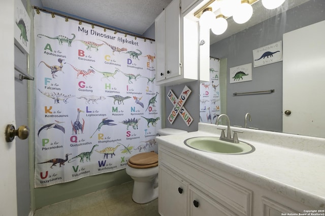 bathroom with shower / tub combo, toilet, tile patterned flooring, a textured ceiling, and vanity