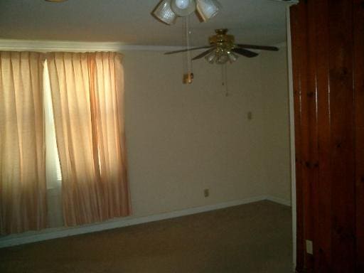 spare room featuring ceiling fan