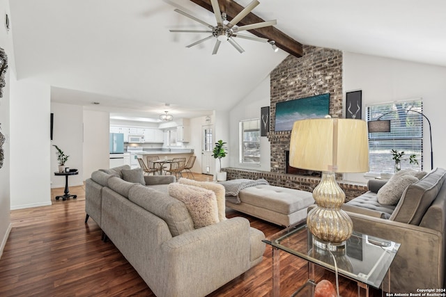 living room featuring plenty of natural light, ceiling fan, and dark wood-type flooring