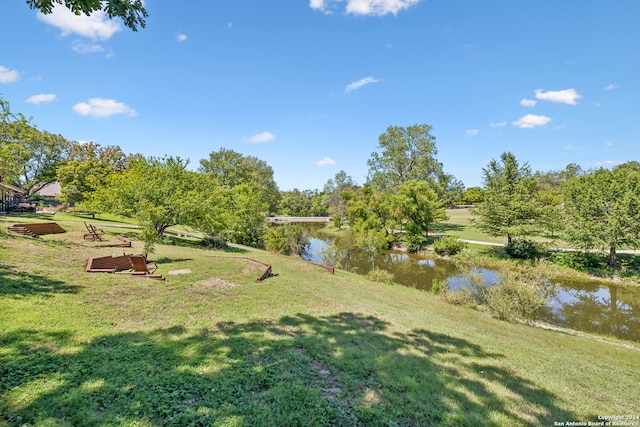 view of yard with a water view